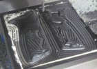 Milled delrin panels during the machining