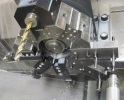 Tool turret setup for bolt endcaps on Haas GT10 lathe